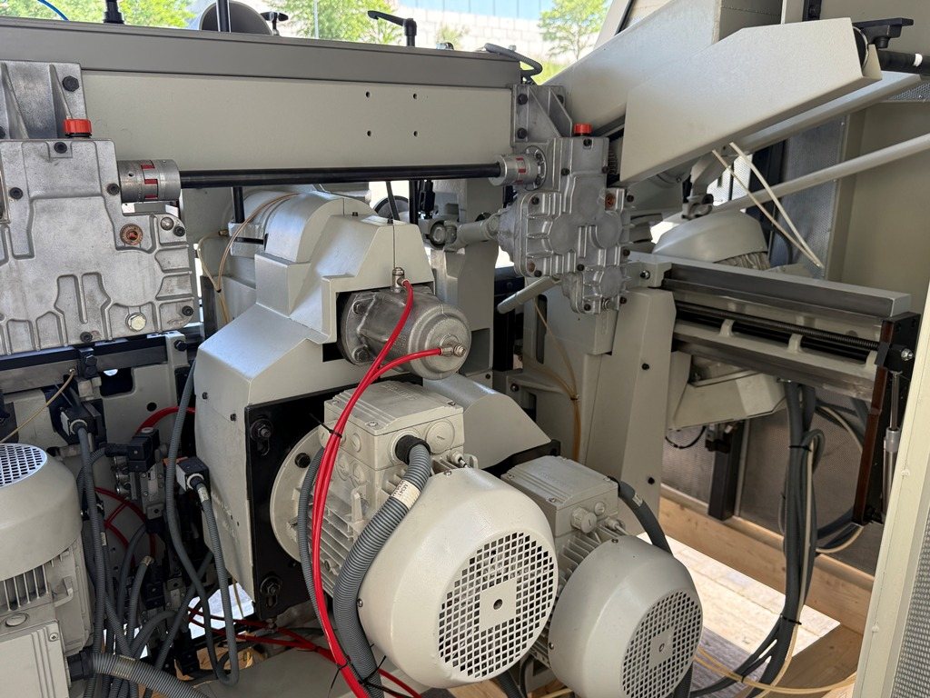 Vierseitenhobelmaschine WEINIG Typ Unimat 23 EL